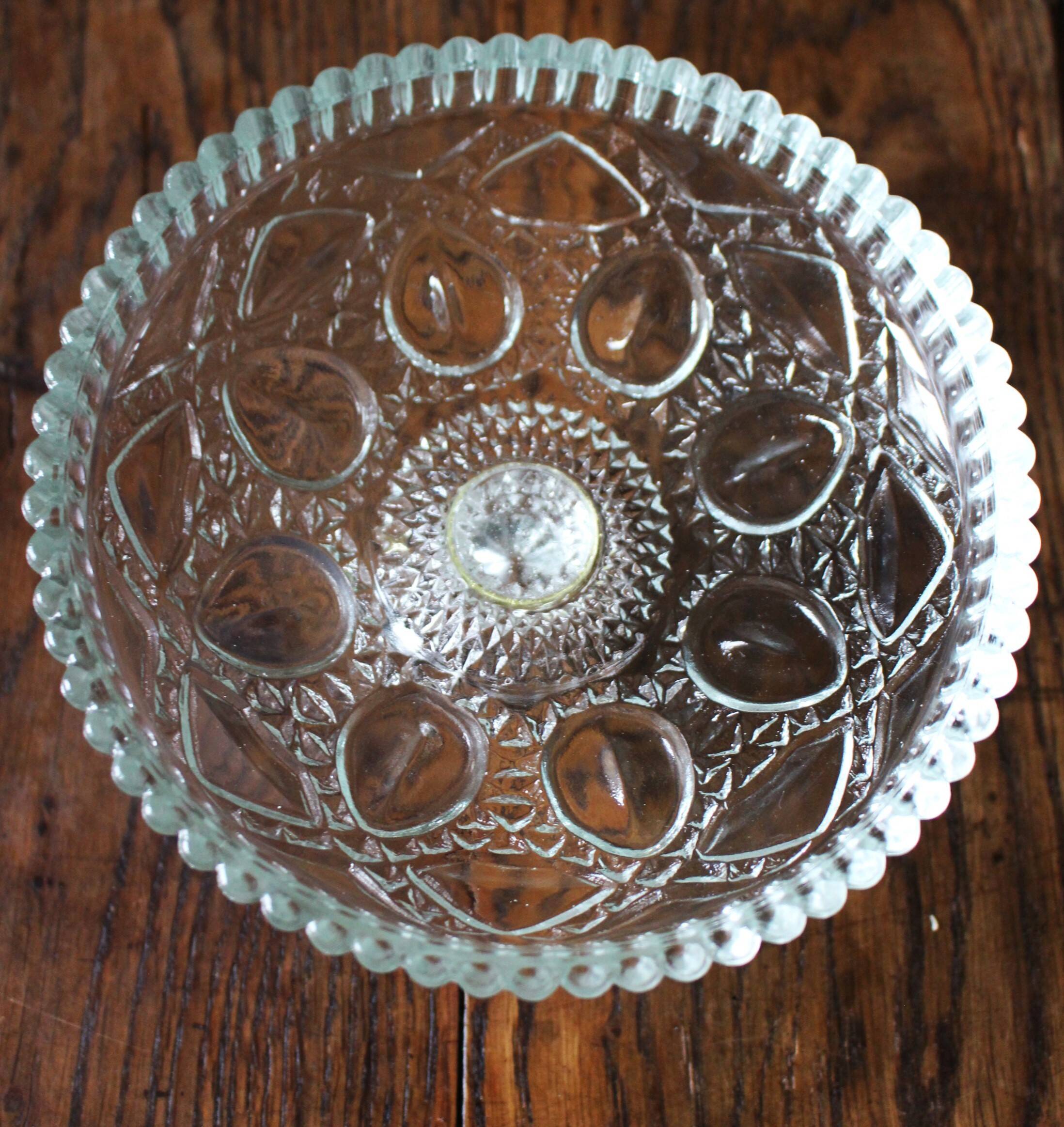 Cut glass goblet with a transparent stem.