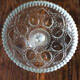 Cut glass goblet with a transparent stem.