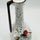 Vintage Italian vase in the shape of a carafe with floral decoration from the 1970s.