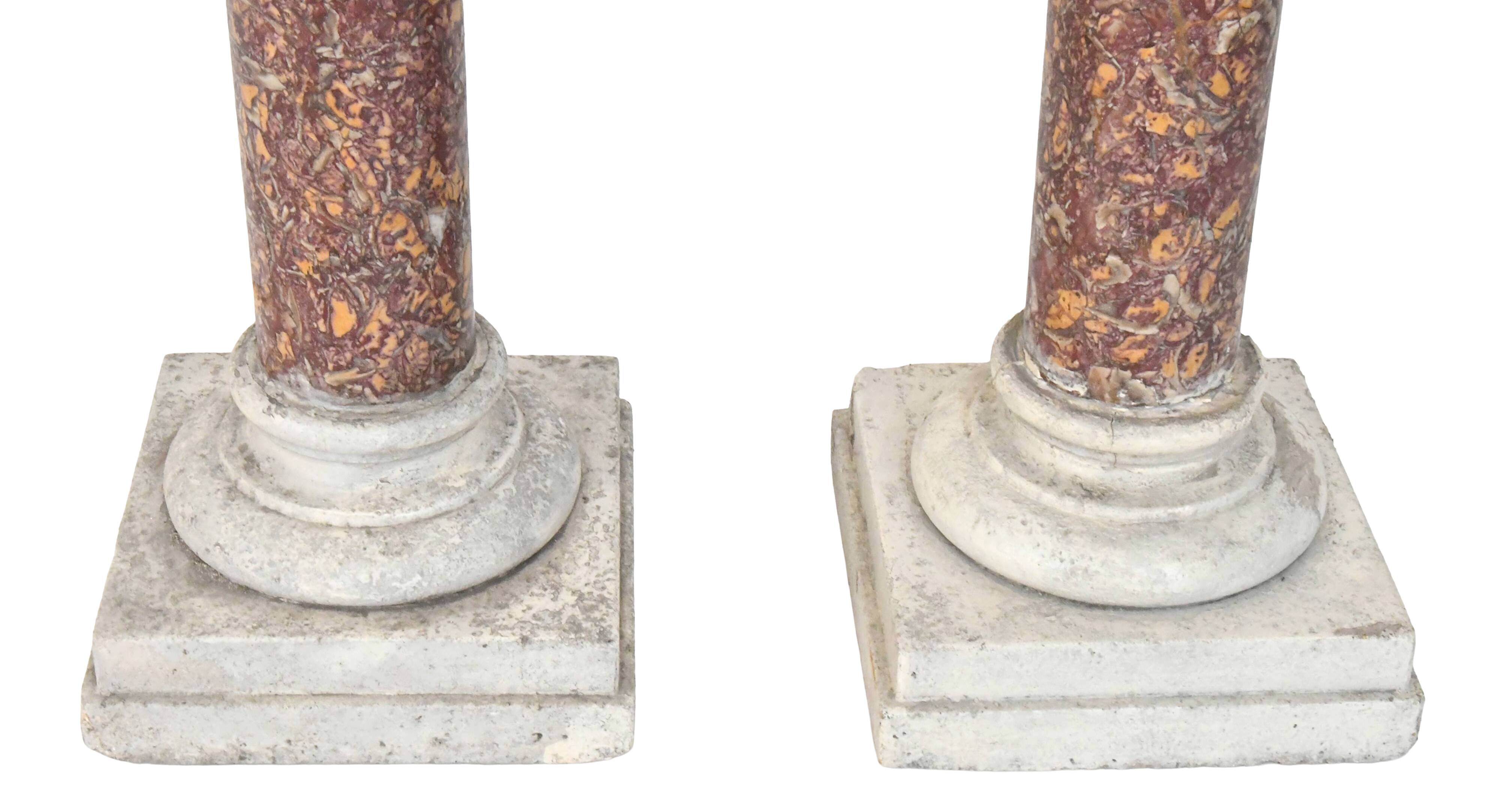 Pair of Brocatelle marble columns and stone with Corinthian capitals.