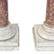 Pair of Brocatelle marble columns and stone with Corinthian capitals.