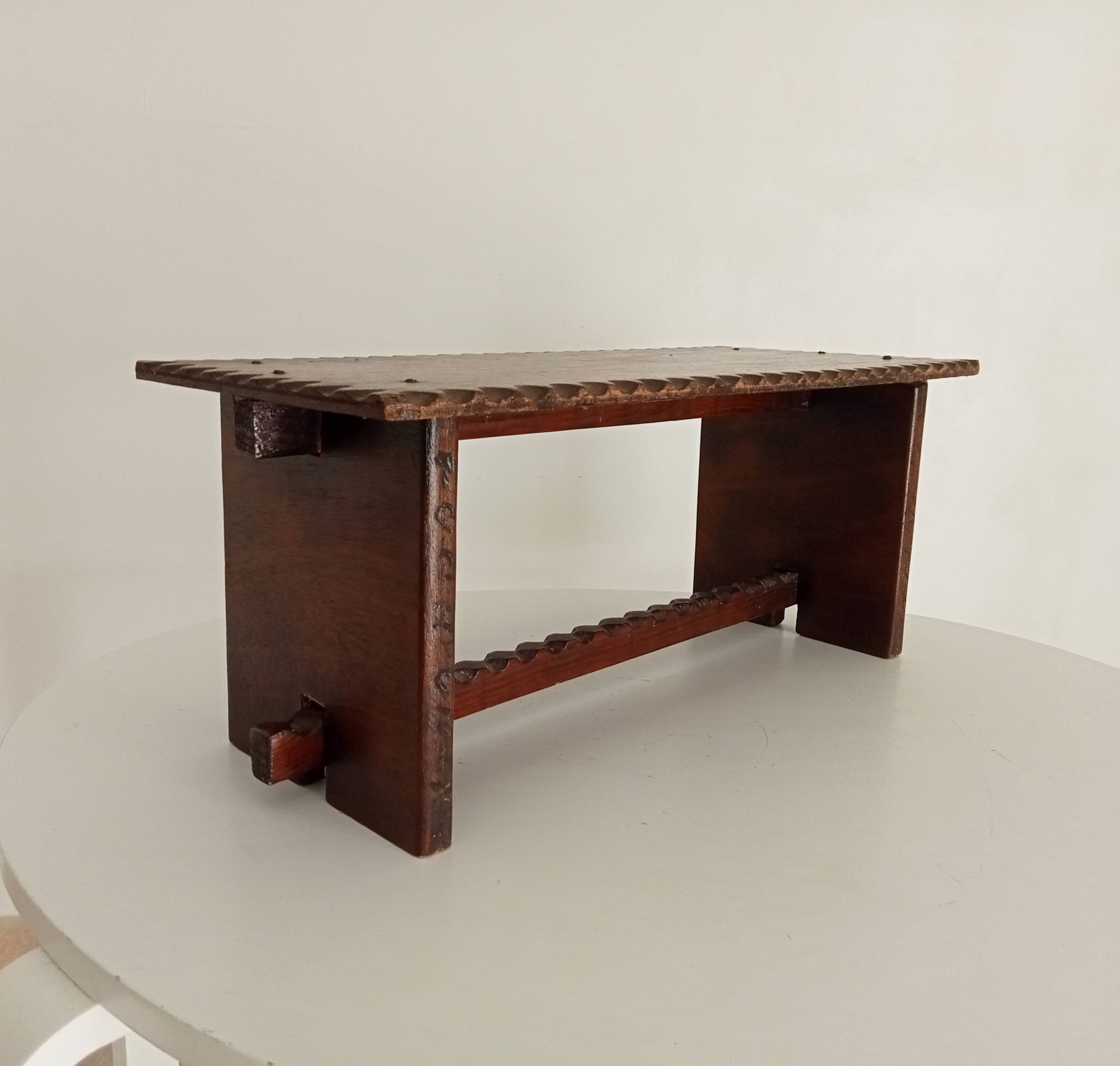 Low brutalist stool in the style of Charles Dudouyt.