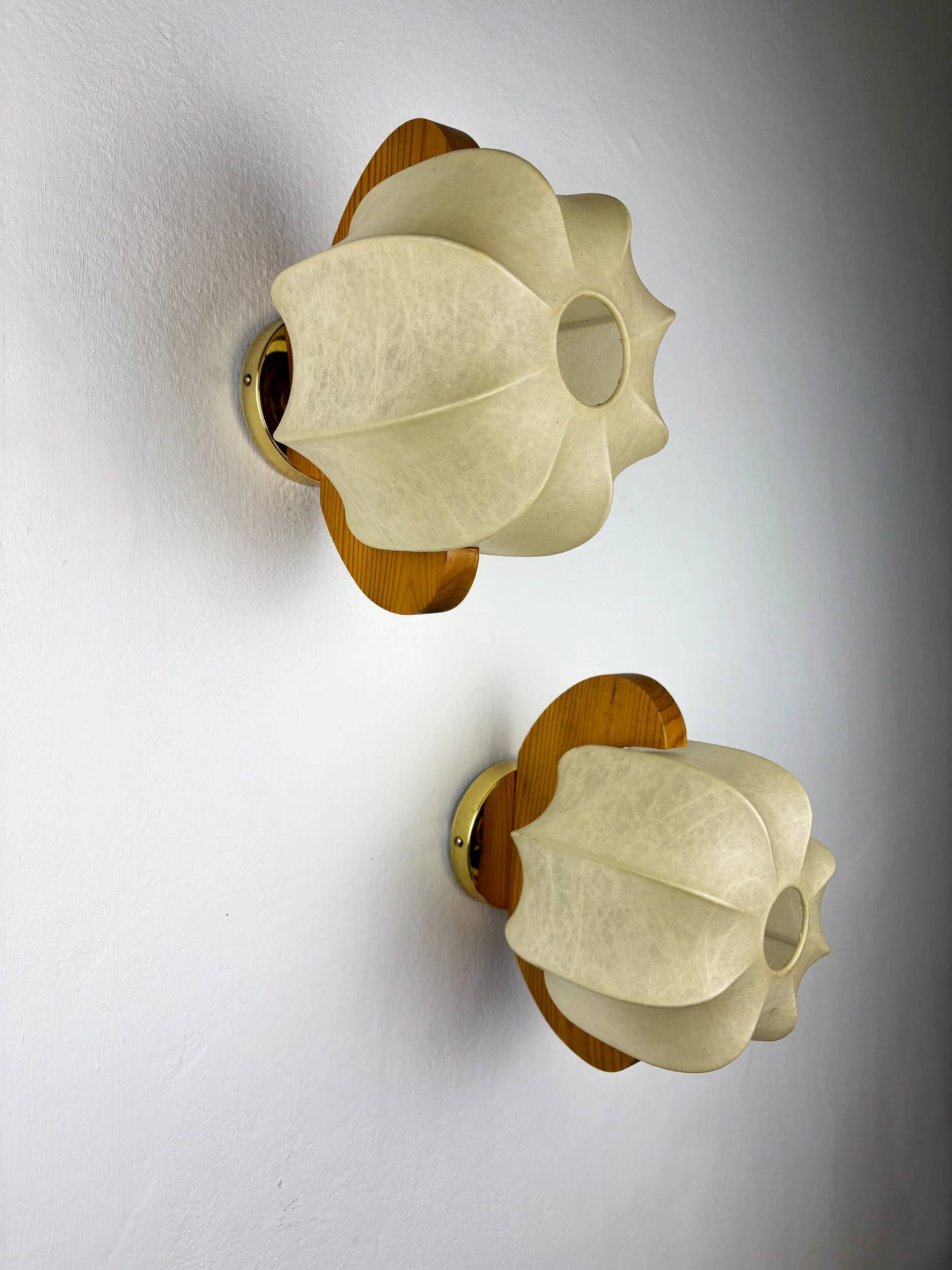 Pair of cocoon sconces with pine, Italy, 1970s