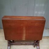 Drop-leaf table called get leg