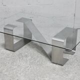 Coffee table with "kinetic" steel base and glass slab. Circa 1970.