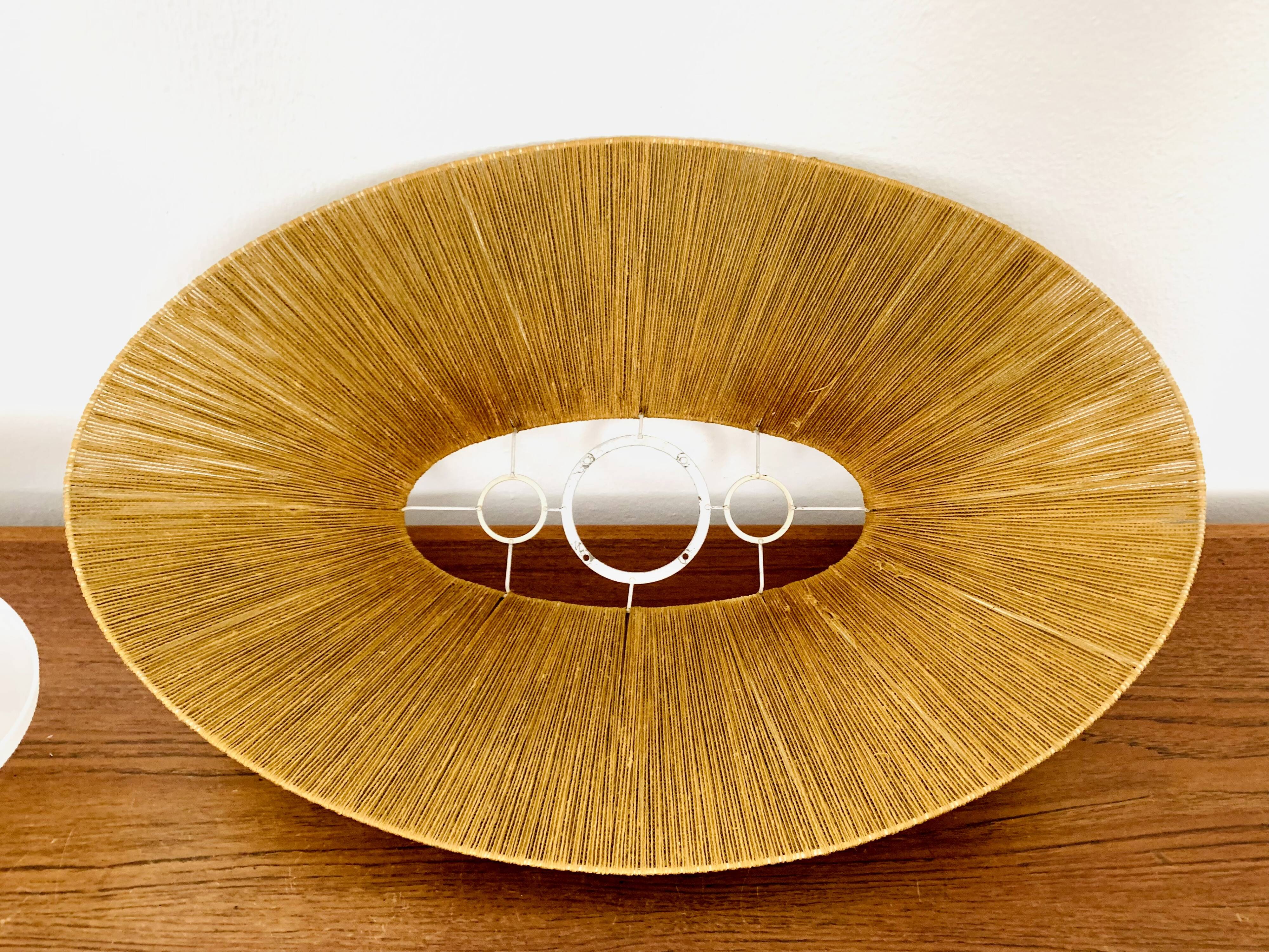 Raffia Bast and Teak Pendant Lamp from Temde