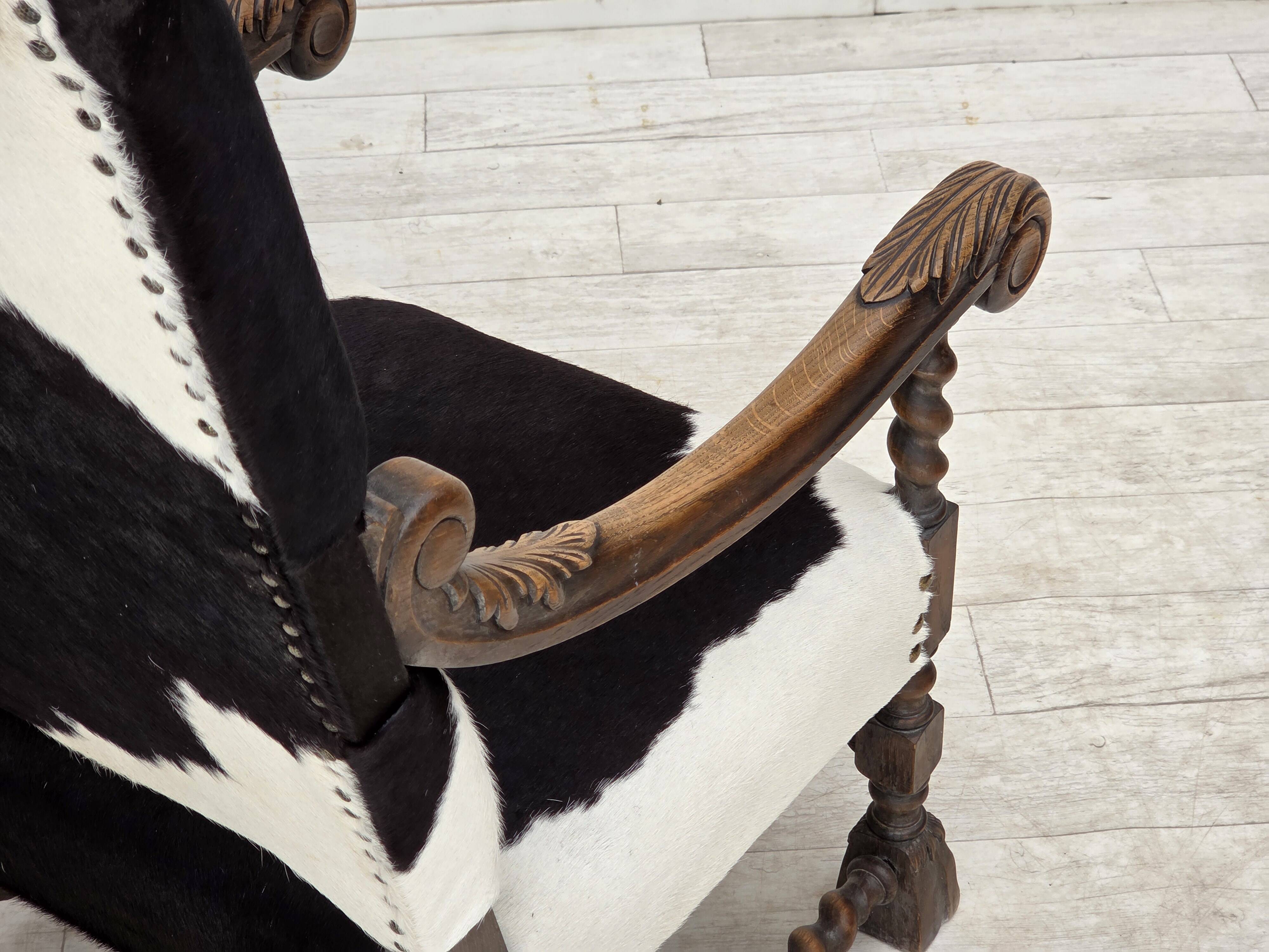 1950s, Danish highback armchair, genuine cowhide, oak wood.