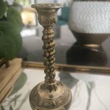 Twisted candlestick in gold metal