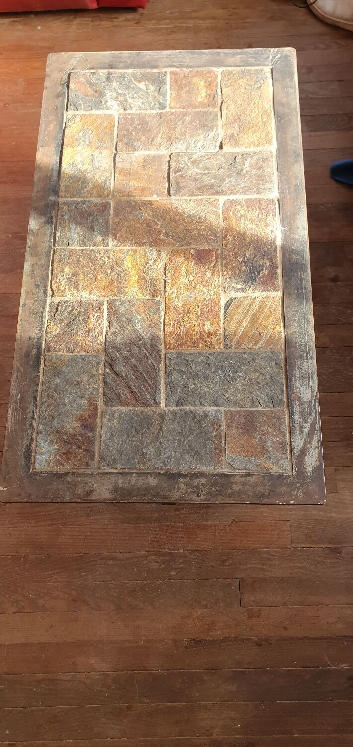 Blacksmith coffee table made of wrought iron and slate.