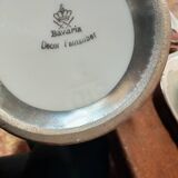 Breakfast set with tea or coffee in porcelain.