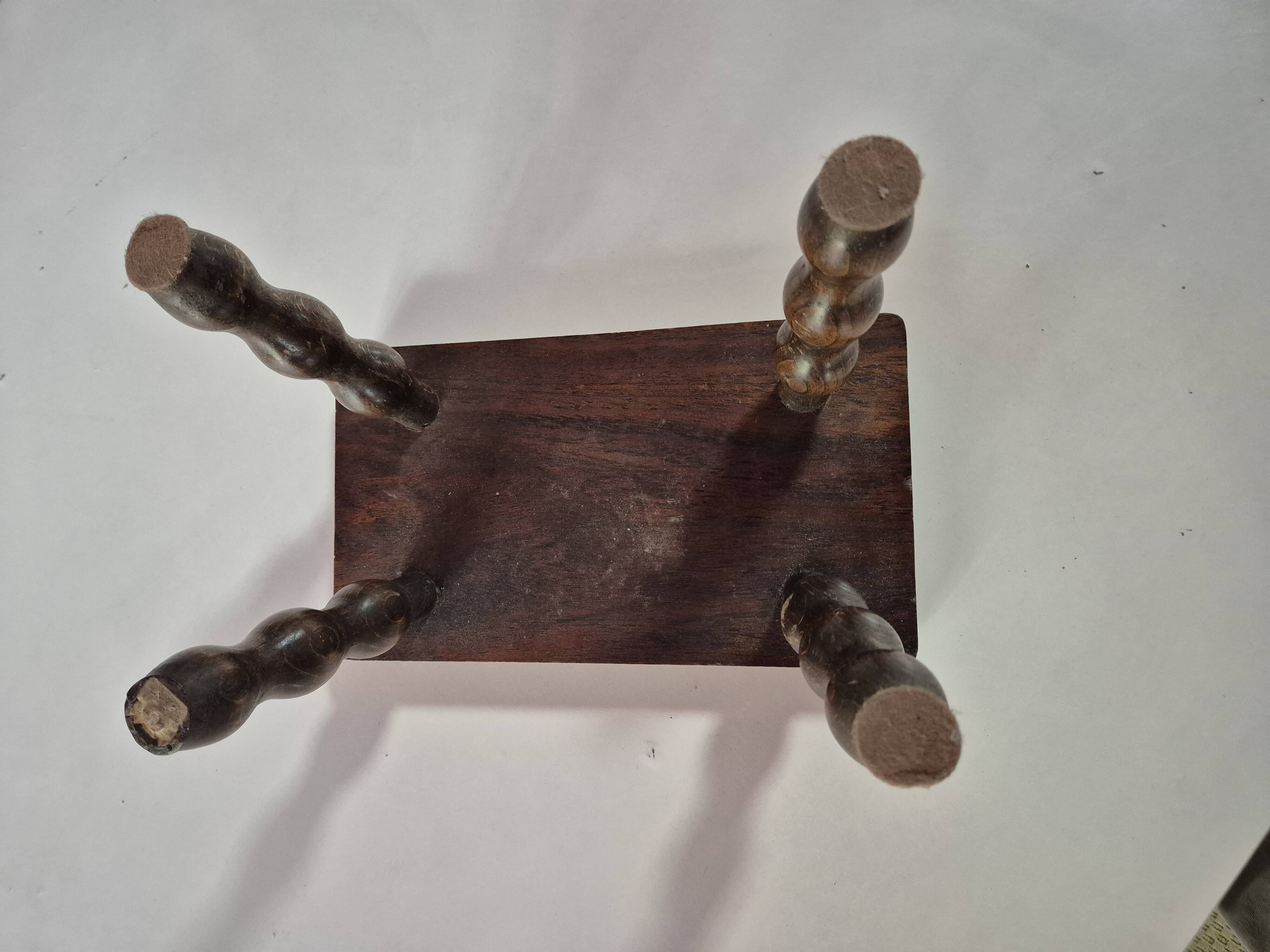 Mini footstool with vintage twisted legs.