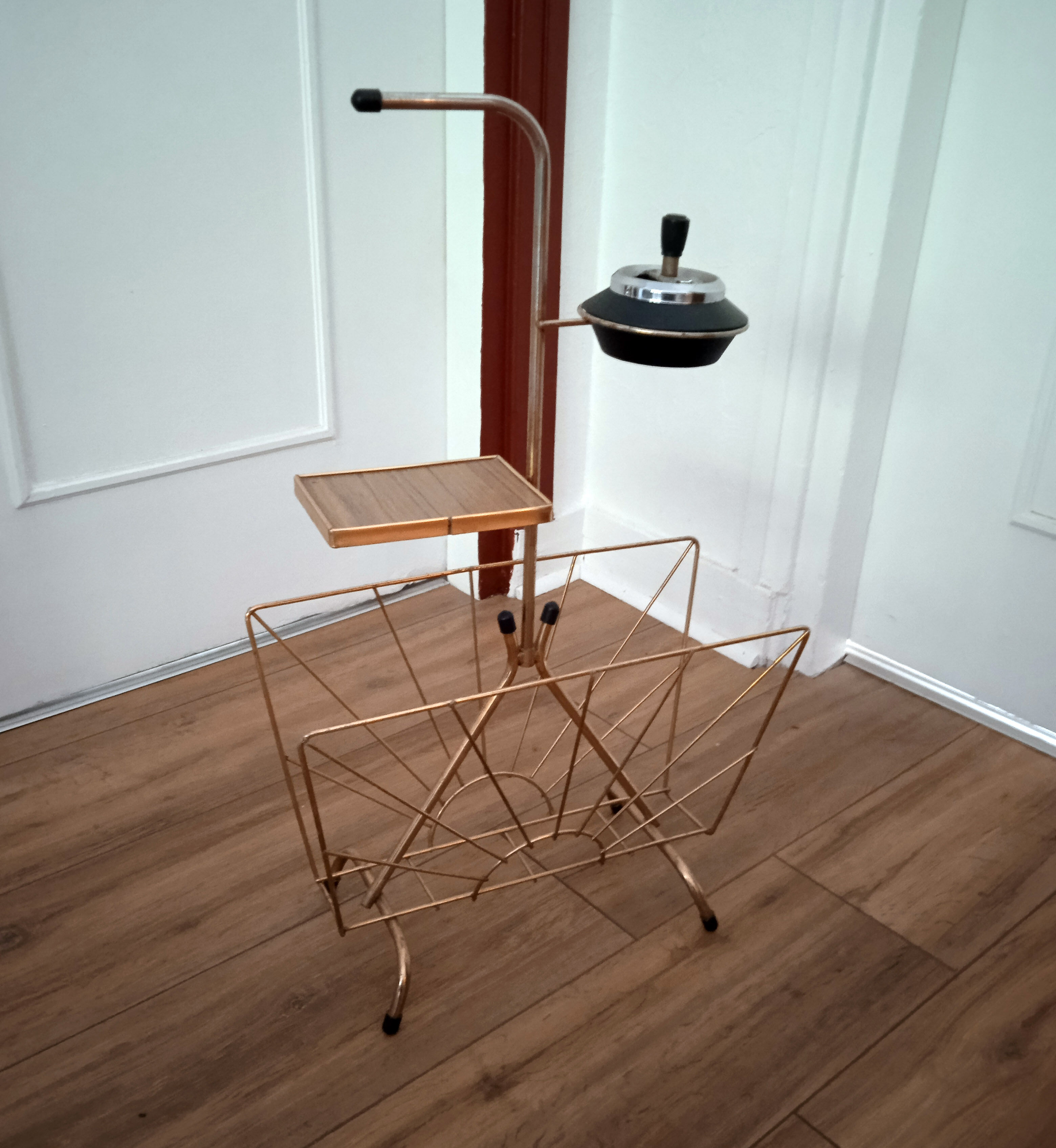 Modernist brass magazine holders