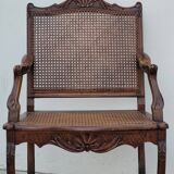 Louis XV Regency cane armchair leather armrests decorated with shell