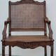 Louis XV Regency cane armchair leather armrests decorated with shell