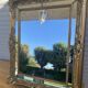 Golden mirror with a closed pore.