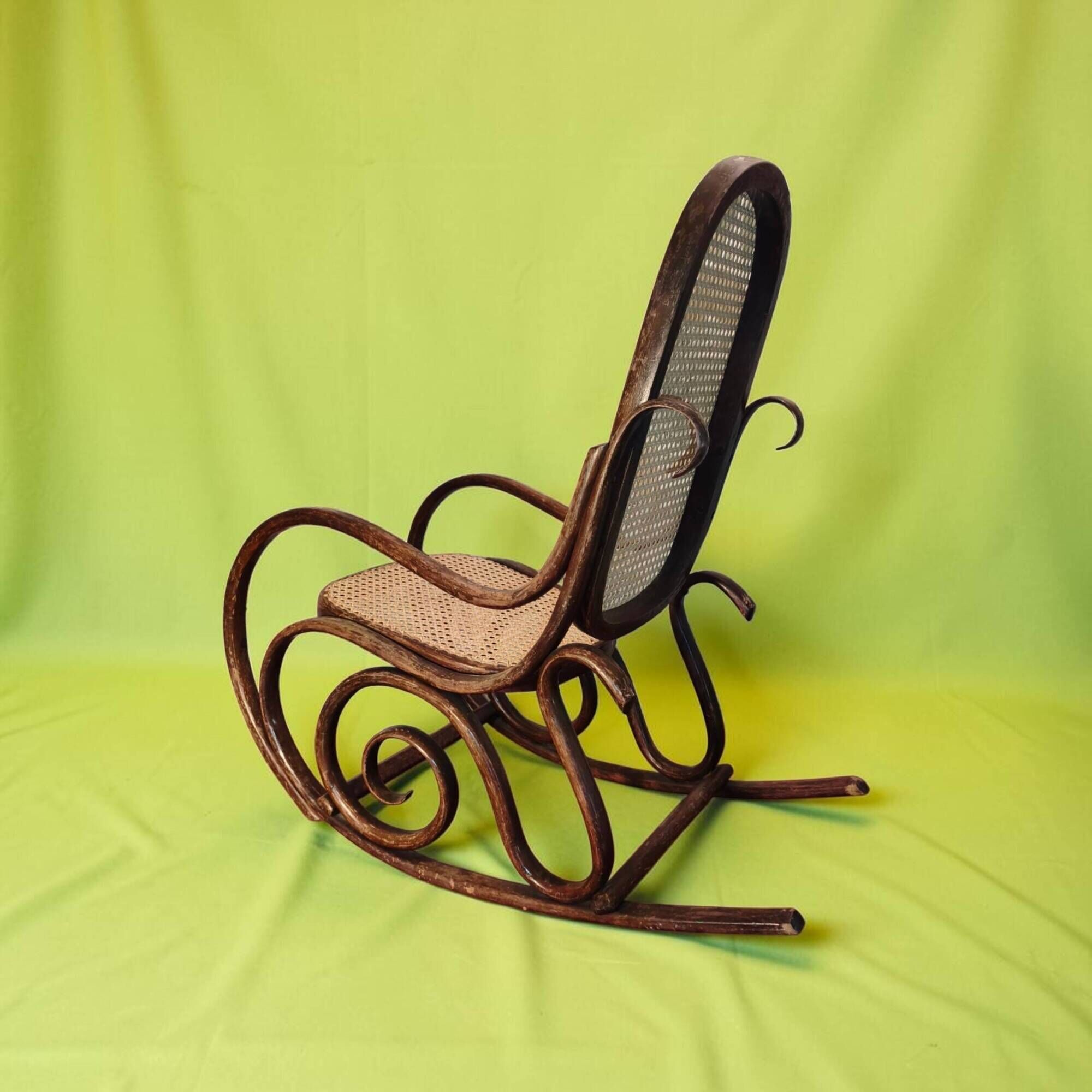 Antique curved wooden rocking chair with caning in Thonet style - Child size