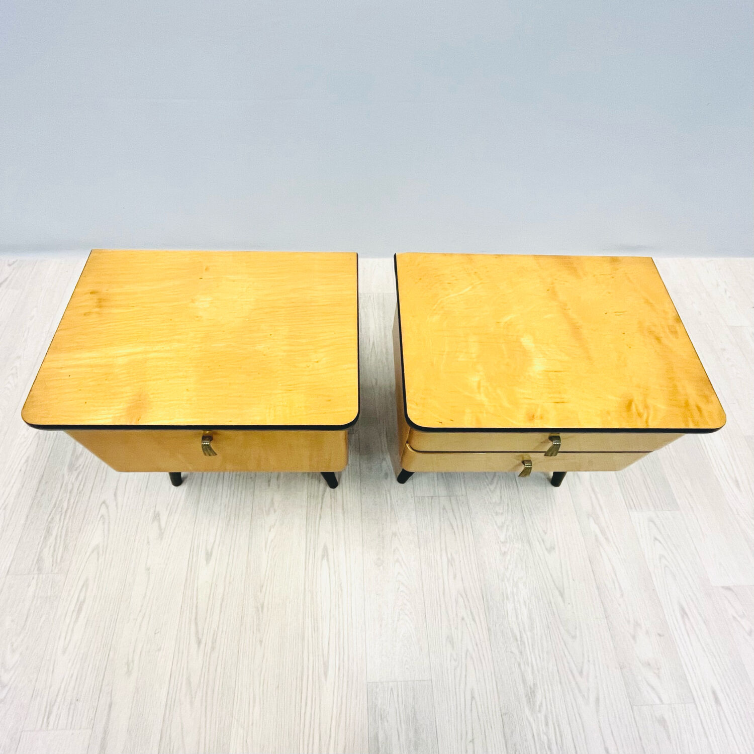 A pair of night cabinets