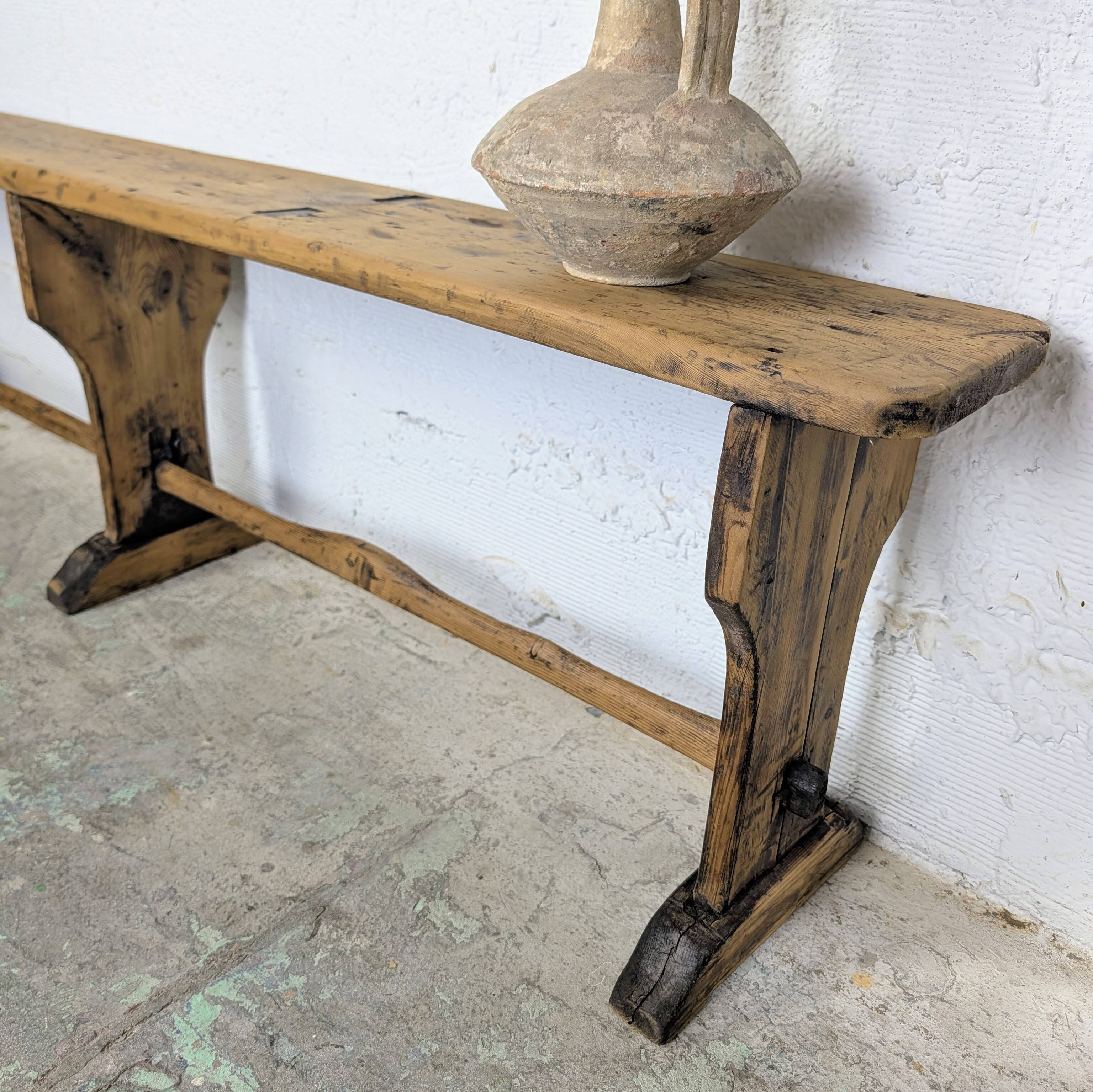 Old farmhouse bench in raw wood