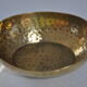 Empty hammered brass pocket