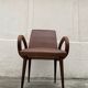 Mid Century Scandinavian vintage retro armchair with oval armrests.