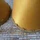 Pair of small old orange lampshades with trimmings