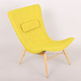 Yellow mid century modern armchair, made in 1950