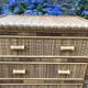 Vintage rattan chest of drawers has 3 drawers.