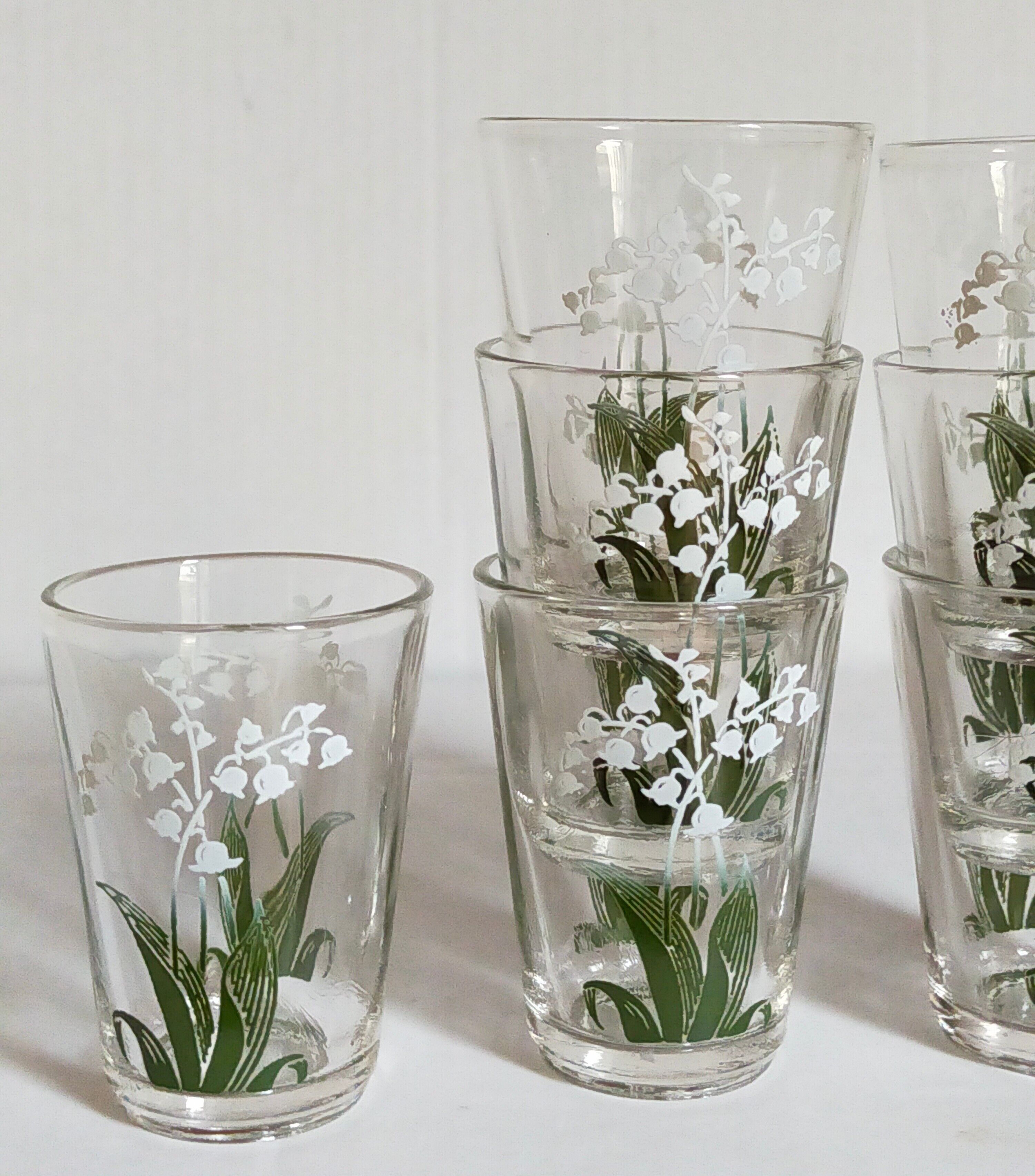 Seven glasses with digestive screen-printed with thrush, 30s