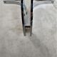 Chrome metal coffee table and oval smoked glass tray