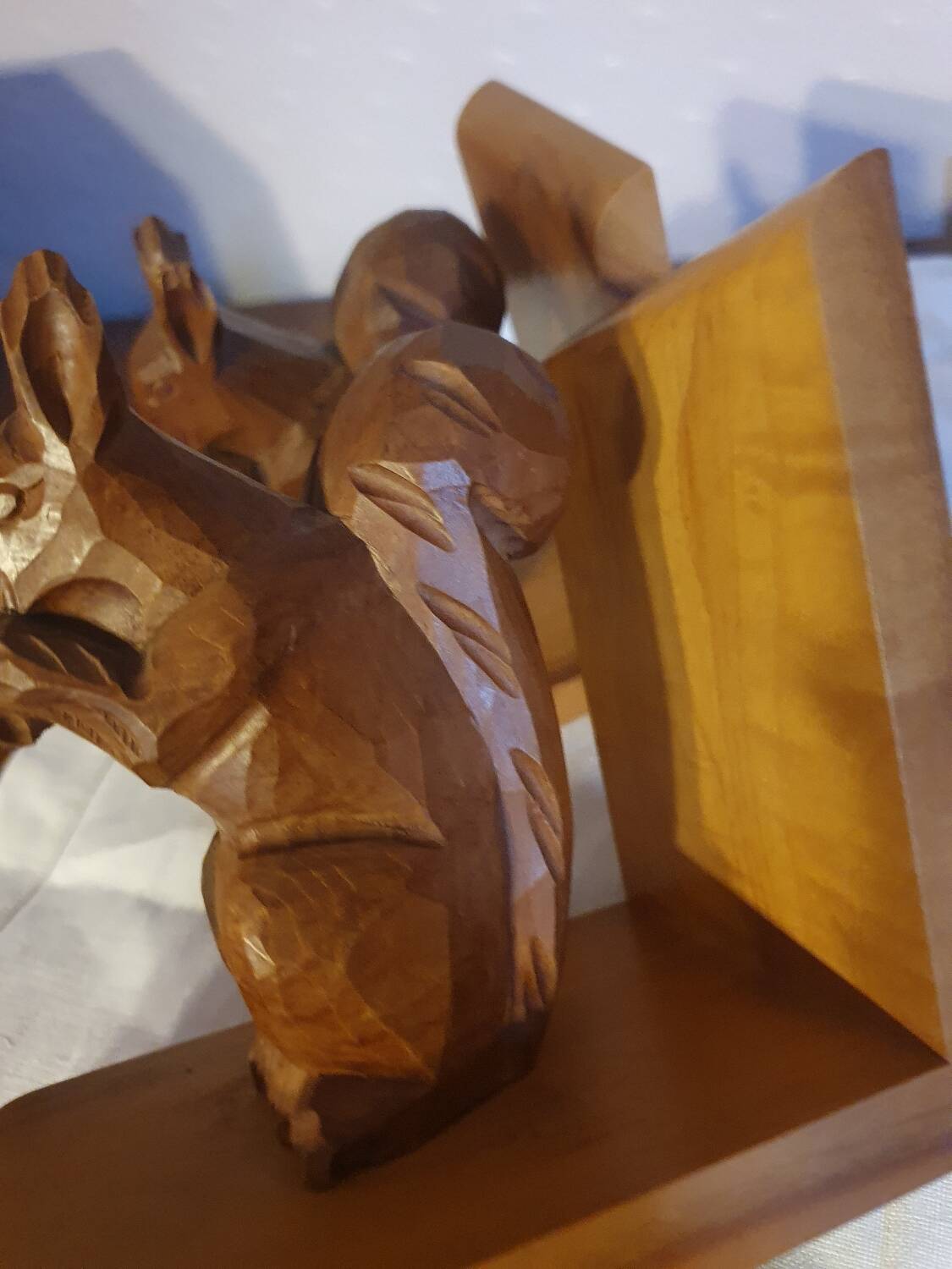 Vintage hand-carved wooden squirrel bookend