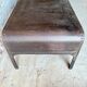 Pair of large riveted metal industrial tables