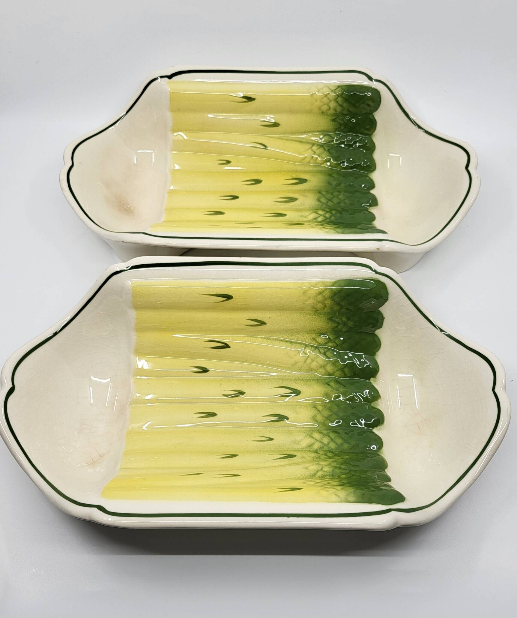 Salins earthenware slip dish decorated with asparagus, French, yellow and green, 20th century