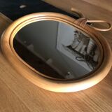 Wicker mirror in the shape of an apple