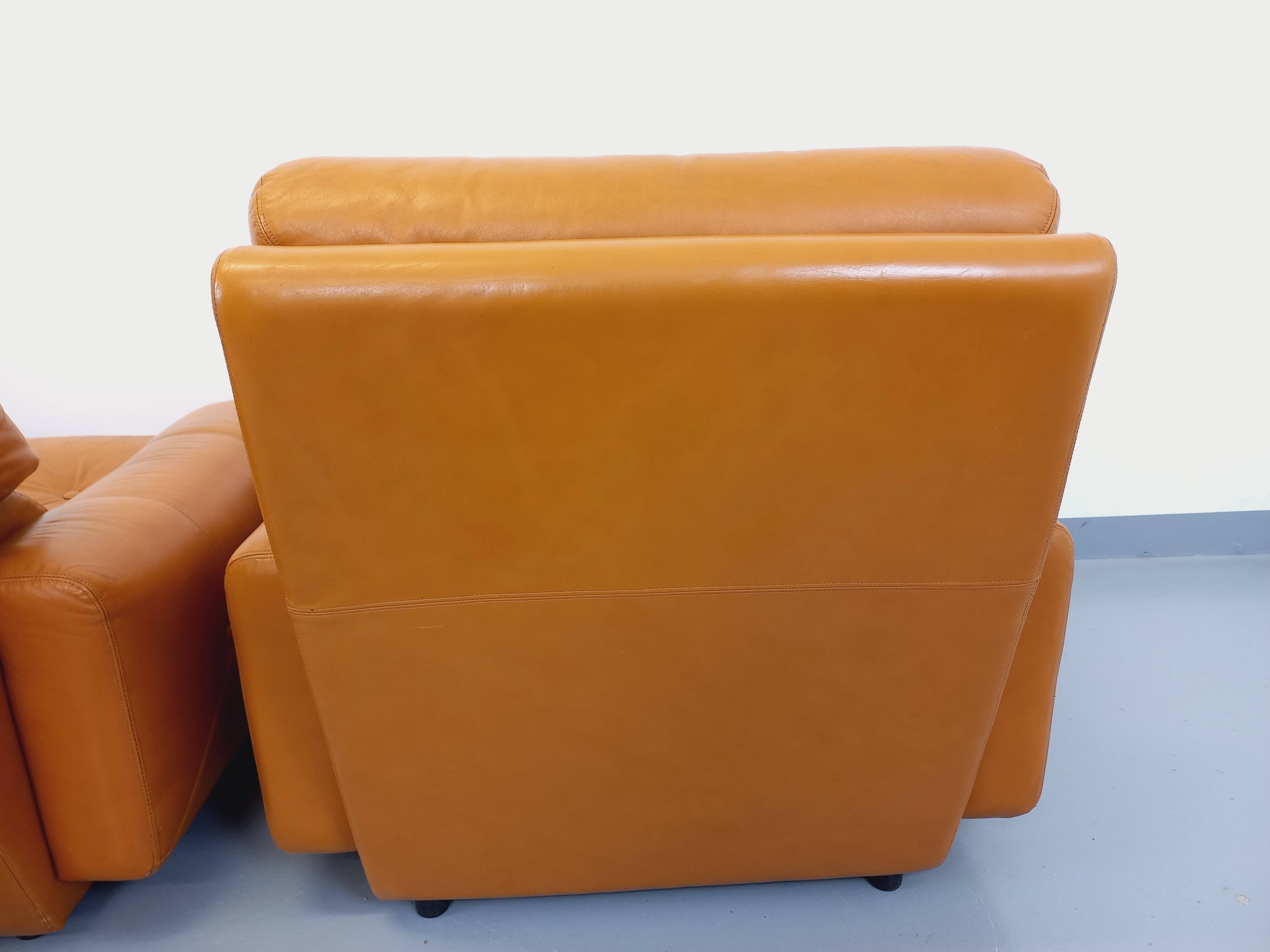 Pair of vintage leather lounge chairs from the 60s and 70s