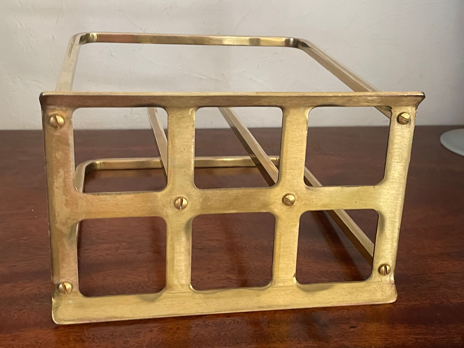 Modernist brass magazine rack circa 1940