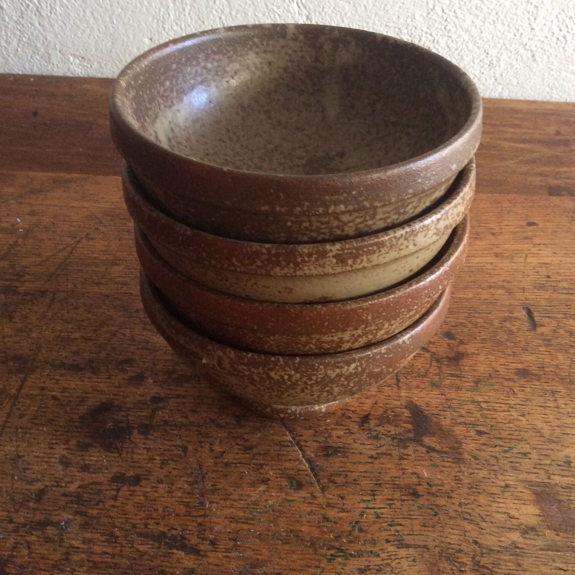 Set of 4 old bowls in stoneware