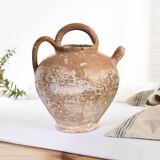Old water jug. Gargoulette. Old terracotta pitcher.