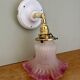 Vintage tulip-shaped lamp in frosted white and pink glass.