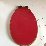 Miroir médaillon en bois doré - 43x24cm