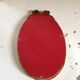 Miroir médaillon en bois doré - 43x24cm