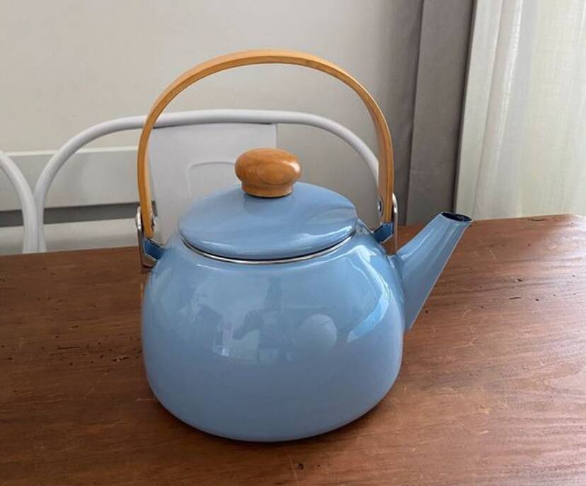Vintage blue enamelled tin teapot with wooden handle