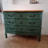 Dark green patina crossbow chest of drawers