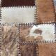 Patchwork carpet in cowhide 164x105cm from the 70s