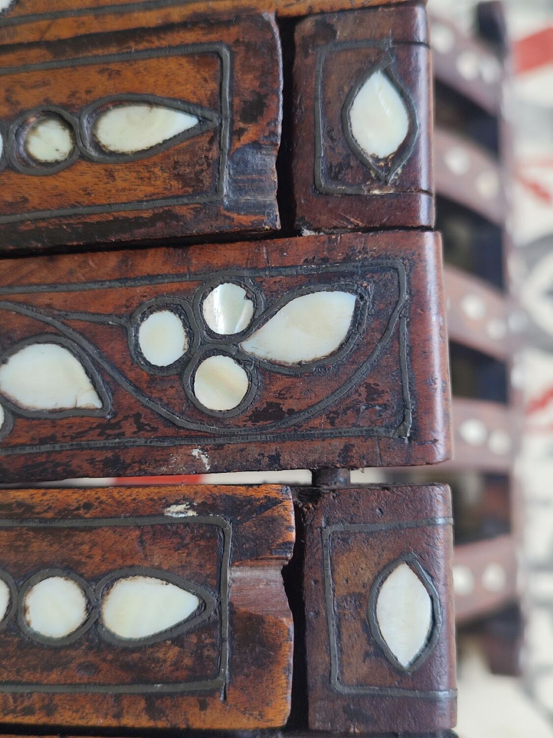 Antique folding oriental chair with mother-of-pearl inlays