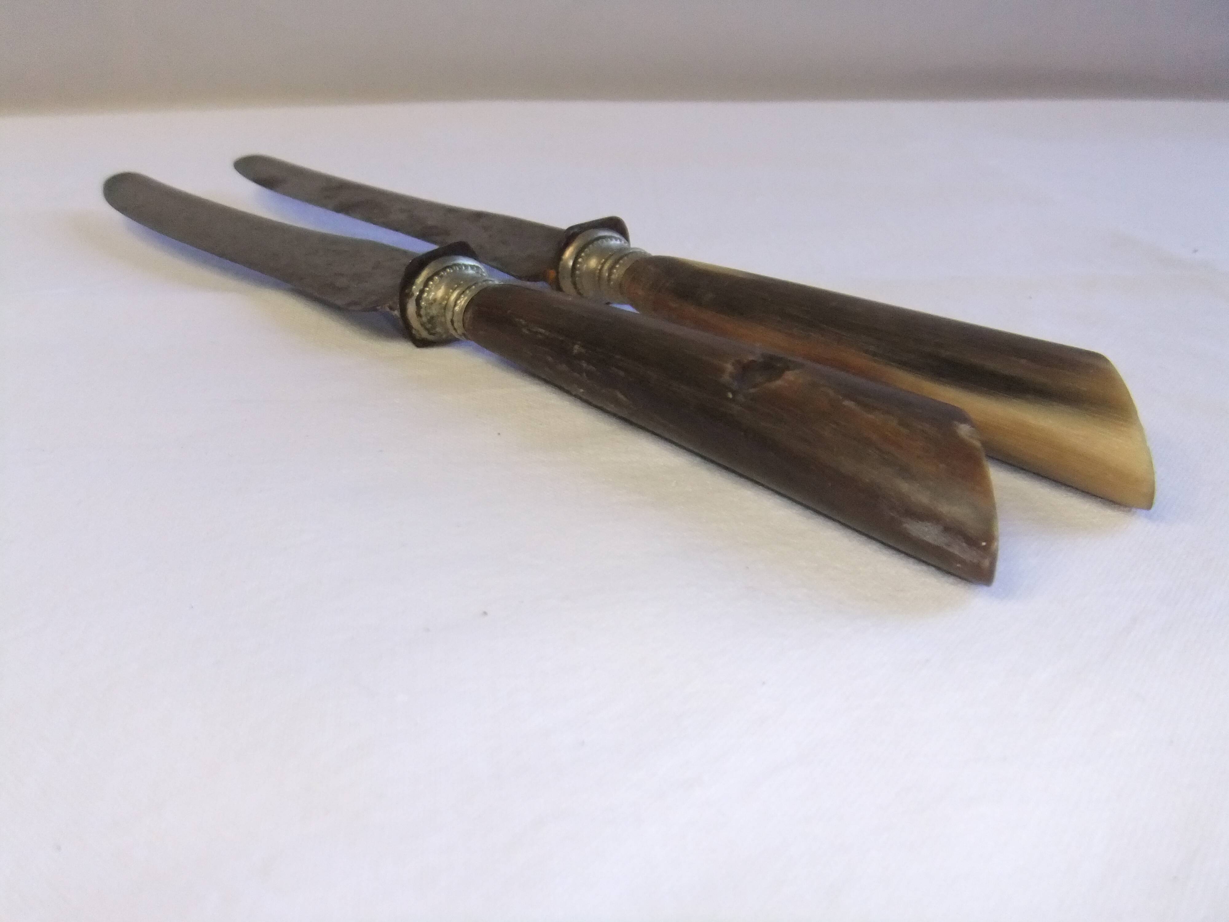 Table service knives old steel blade horn ferrule