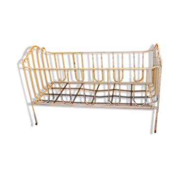 Vintage children's bed with white patina