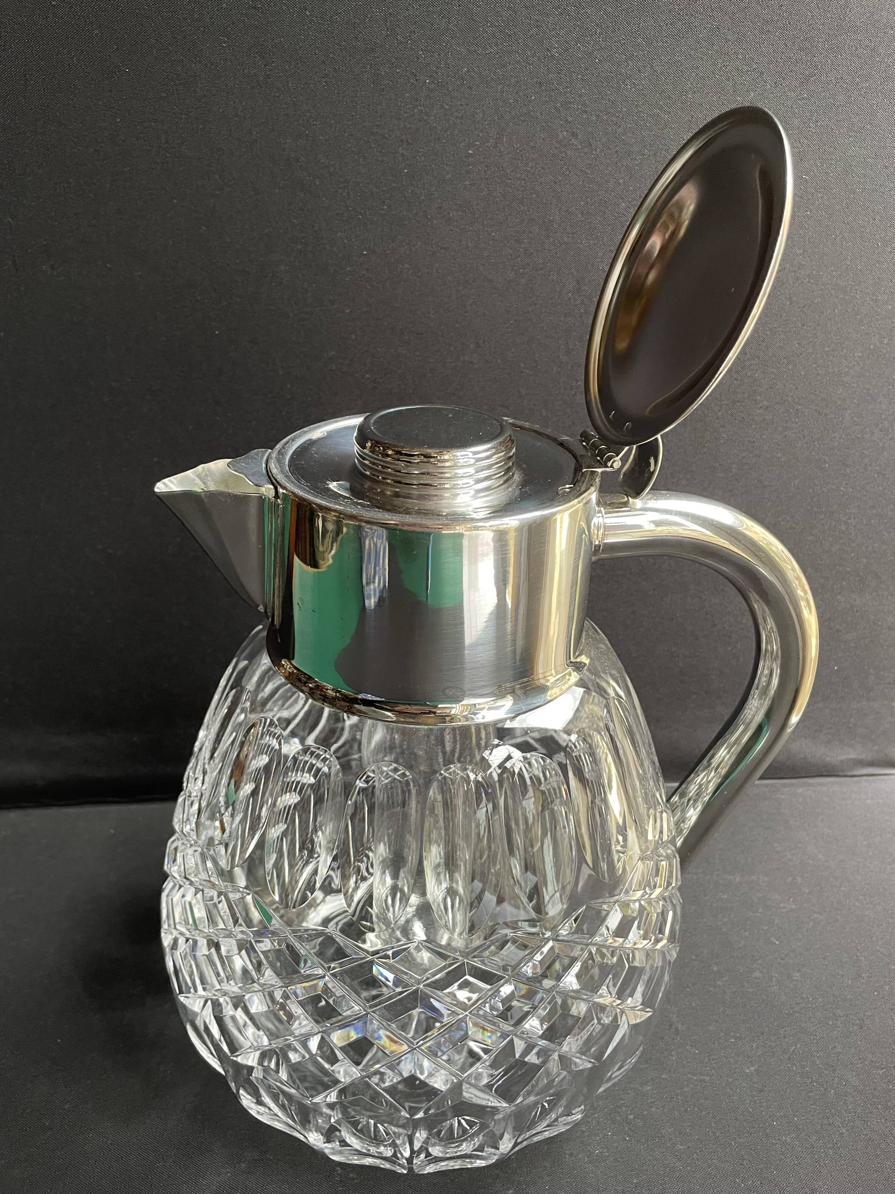 Important jug with ice reserve in cut crystal and silver-plated metal