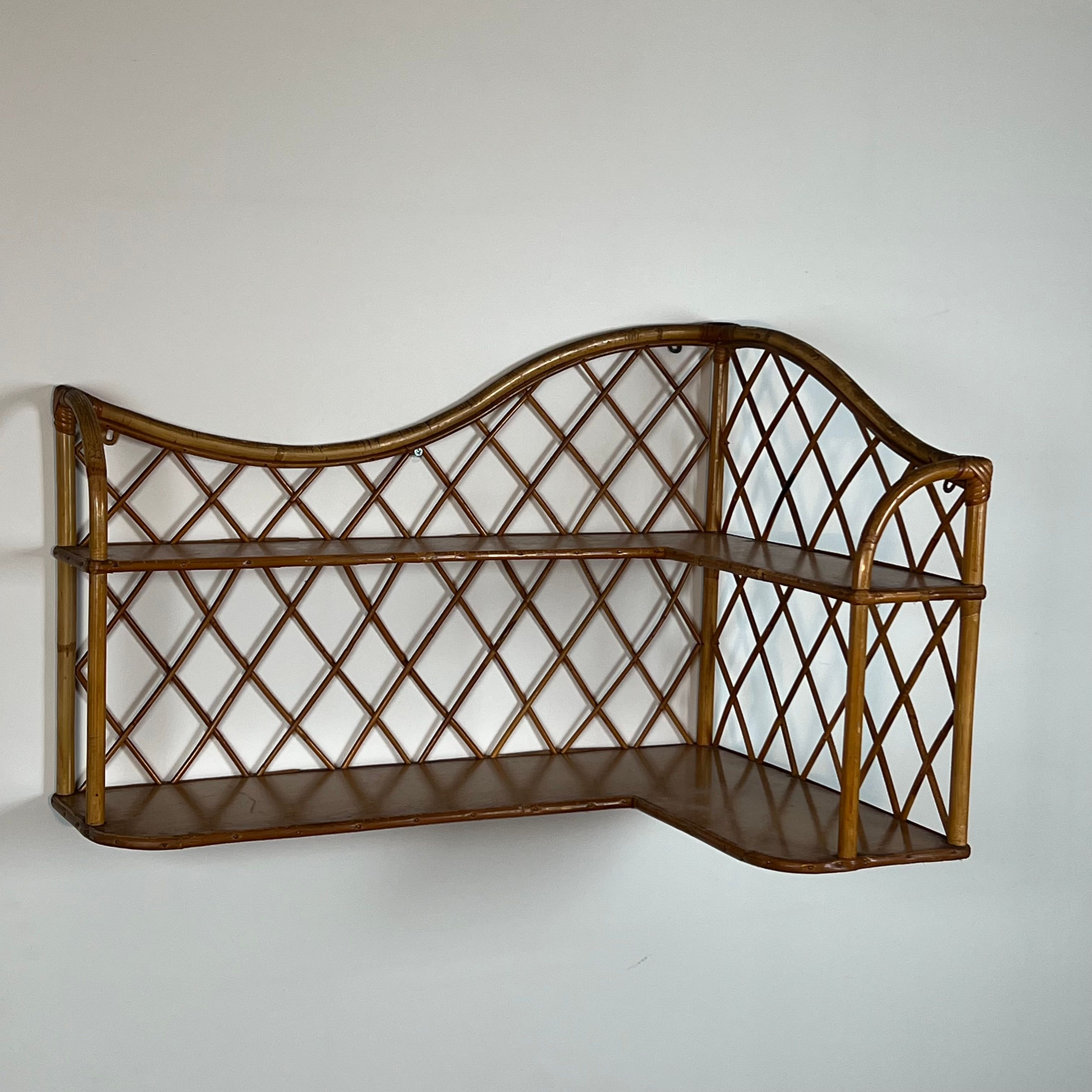 Corner wall shelf in rattan attributed to Audoux-Minet.
