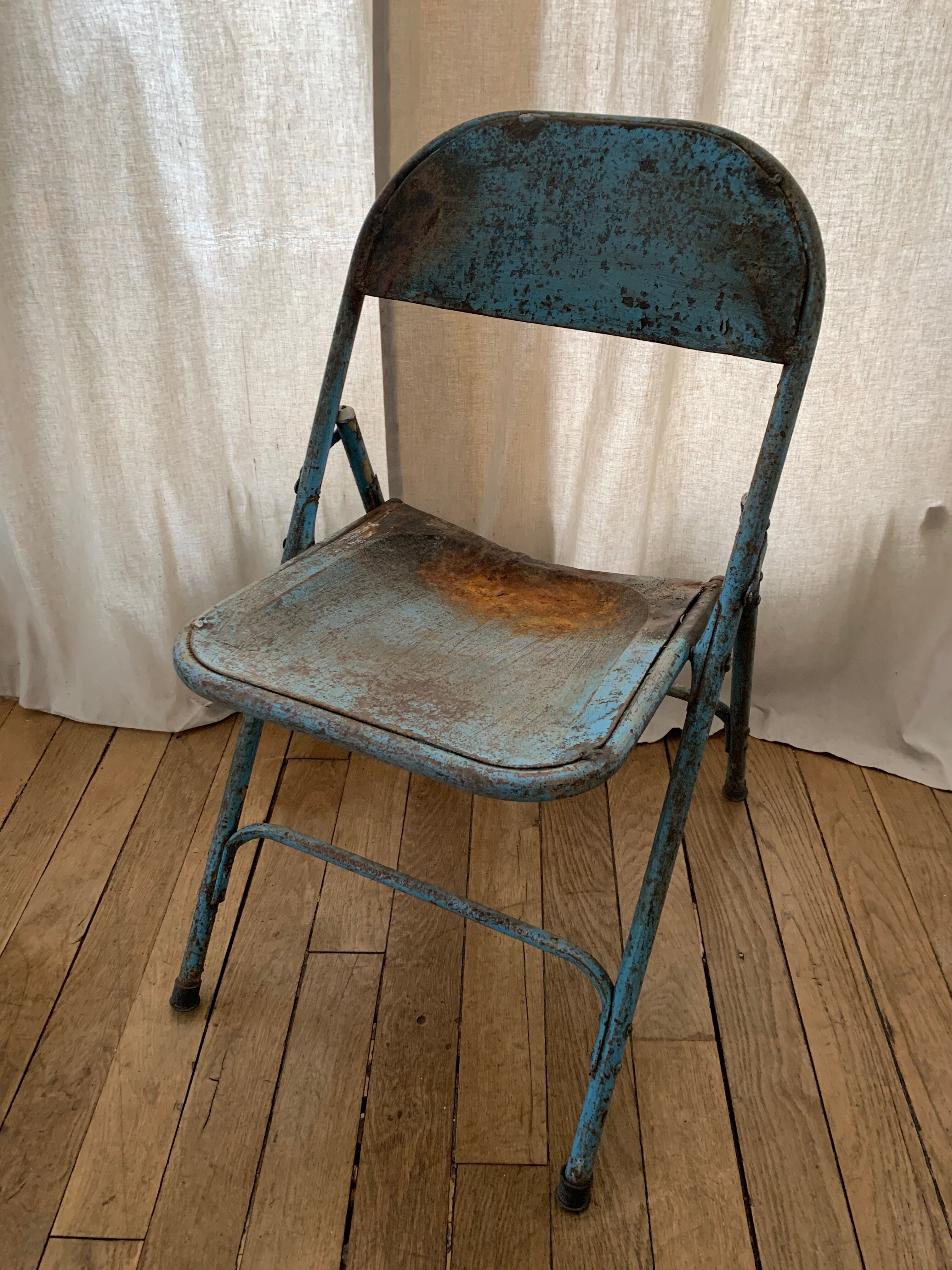 Lot of metal folding chairs