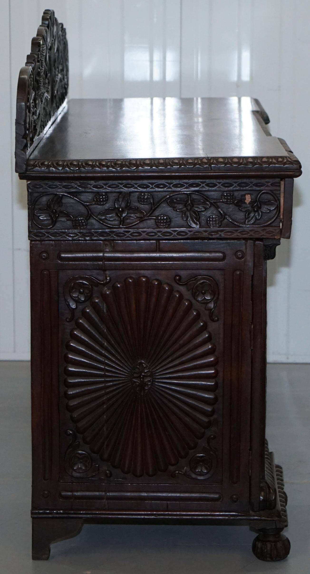 19th-century hand-carved Anglo-Burmese buffet with drawers and cupboards.